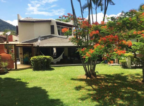 Linda casa com Wifi a poucos passos da Praia